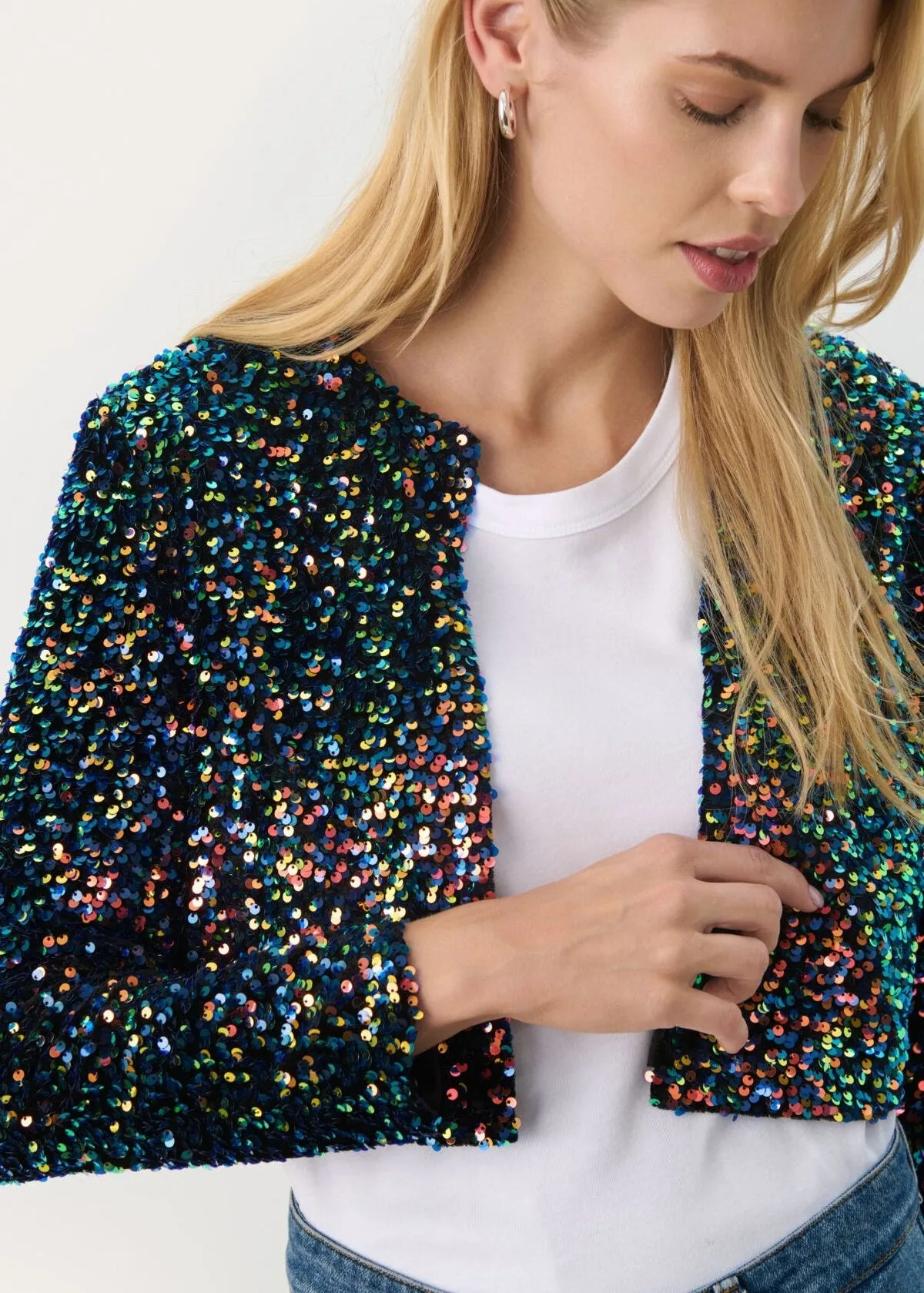 Sure! An optimized title for the Marta Sequin Bolero could be: 

Elegant Marta Sequin Bolero Jacket for Women - Sparkling Evening Wear Cover-Up

This title adds specific modifiers that enhance the product’s appeal and context.